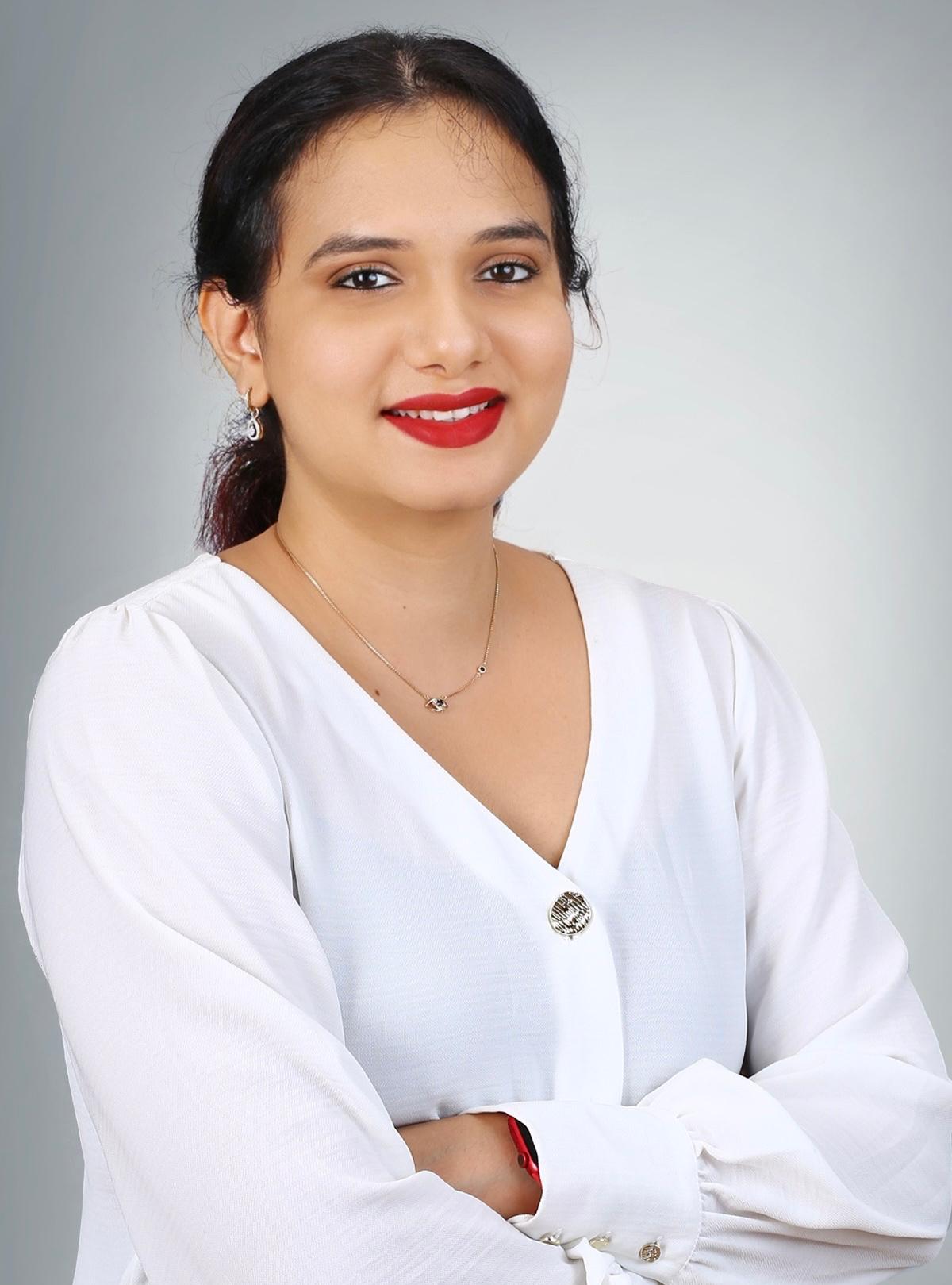 Maneesha B